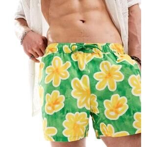 ASOS DESIGN swim shorts in short length in green floral print Size M tropical
